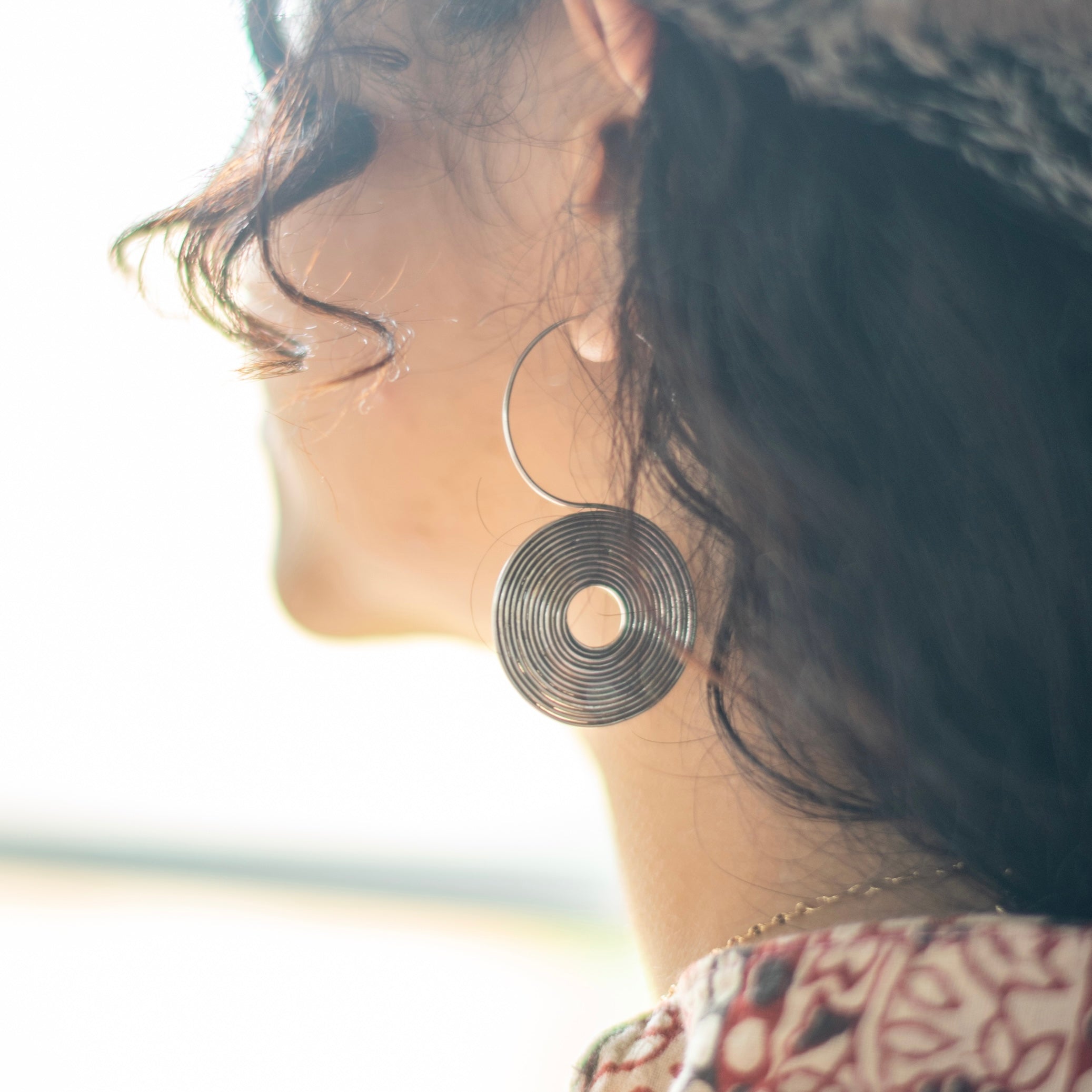 Swirl Silver Disk Earring